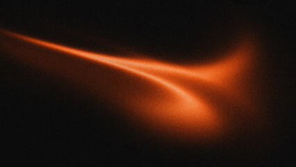 Abstract orange glowing light streak with grainy texture on dark black background © Artmuna