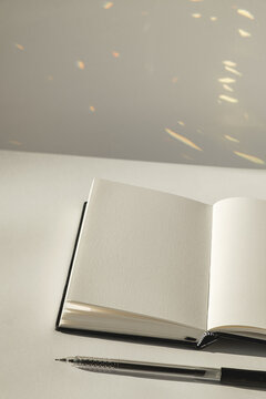 Blank pages invite creativity in a bright and serene space