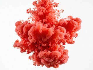 Fototapeta premium Bright coral red smoke cloud floats on white background. Abstract ink explosion creates organic shape with soft textures. Vibrant crimson pigment swirl looks like blooming flower nebula in space.