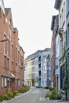 Quaint narrow alley full of beautiful modern buildings in Antwerp, Belgium, Europe
