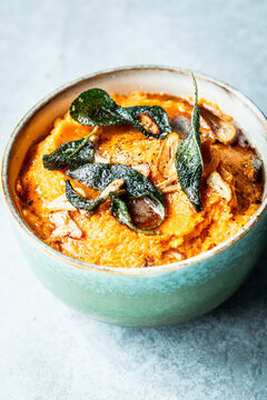 Sweet potato puree topped with sage-garlic butter