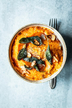 Sweet potato puree with sage and garlic butter topping