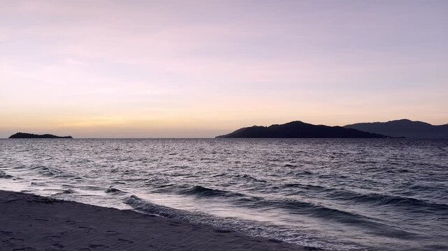 Serene Sunset Over Tropical Ocean and Islands