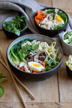 Ramen noodle bowl with pak choi, shiitake mushrooms, carrot
