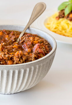 Bolognese sauce with minced meat and vegetables served in bowl