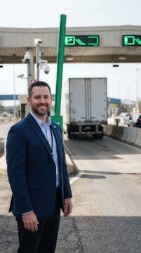Terminal Manager Standing by Clearance Barrier at Freight Checkpoint