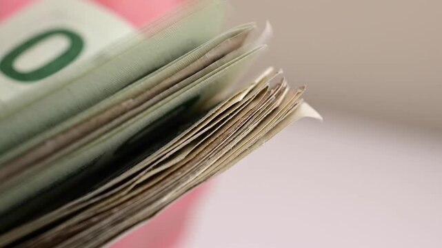 Stock of hundred dollars bills bokeh macro close up, texture, in and out of focus, abstract money finances, studio selective focus real time video	