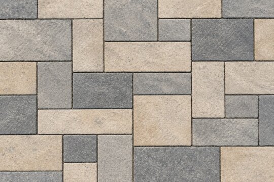 Modern gray and beige interlocking concrete pavers geometric stone surface for patio driveway walkway landscaping hardscape architecture design