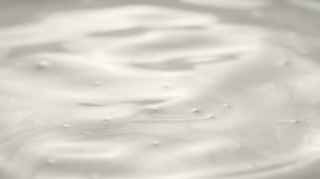 Abstract Close-up of Creamy White Substance with Subtle Bubbles