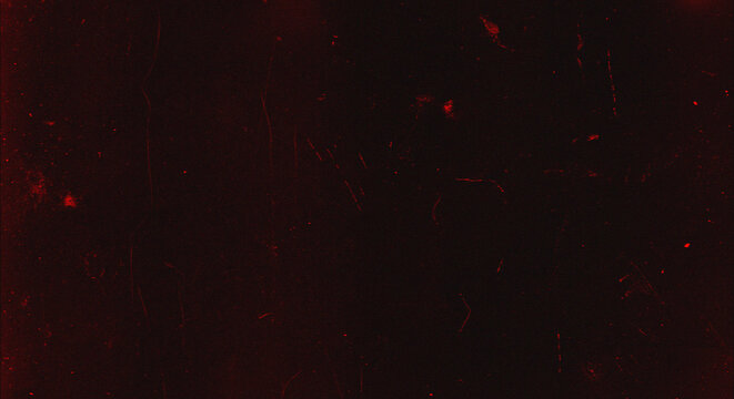 Dark red grunge film texture background with dust, scratches and grain