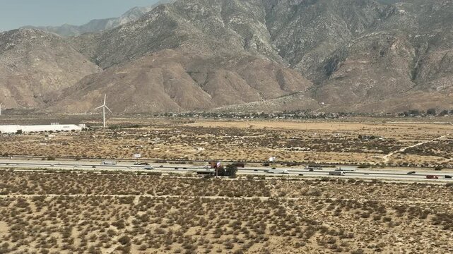 San Gorgonio Pass Wind Farm by 10 Freeway Aerial Shot Pan Left California USA
