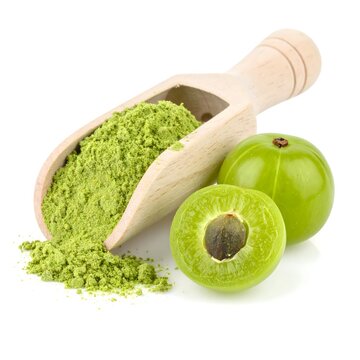 Wooden spoon of amla powder on white background