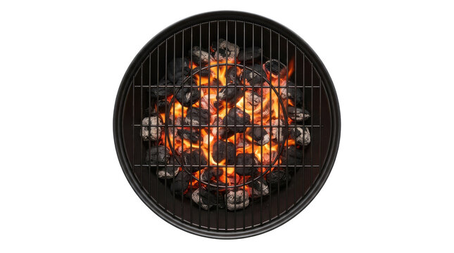 Top down directly overhead view of a round black charcoal grill filled with glowing burning briquettes and vivid orange flames beneath a metal cooking grate isolated on a pure white background