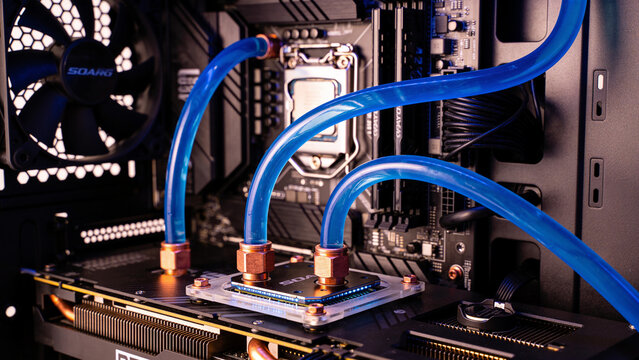 Liquid cooling loop over a processor - clear tubing carrying blue