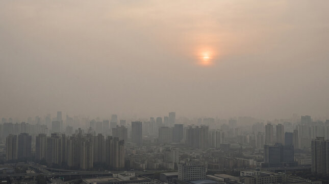 Asian city skyline in heavy smog with copy space, PM2.5 air pollution concept
