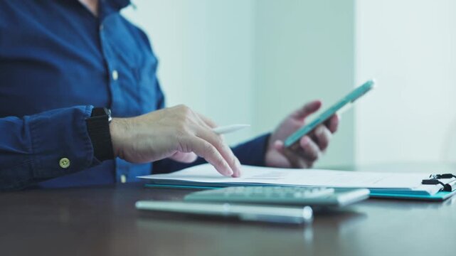 Accountant conducts audit calculation procedures, balancing account records as calculation tasks support audit review alongside rigorous calculation.