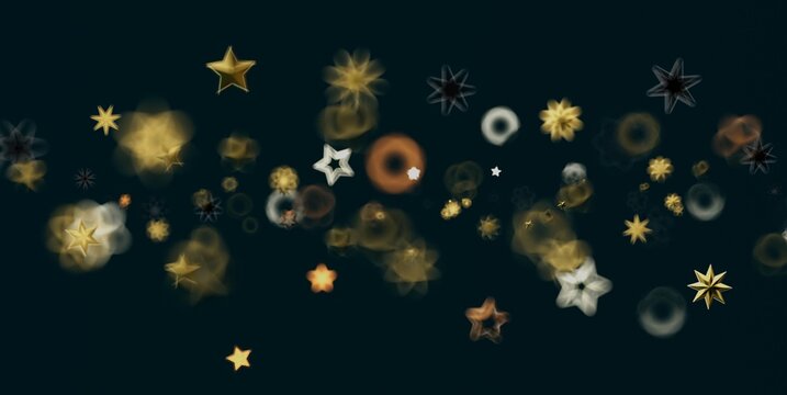Abstract dark background with shimmering golden stars and soft bokeh light effects.