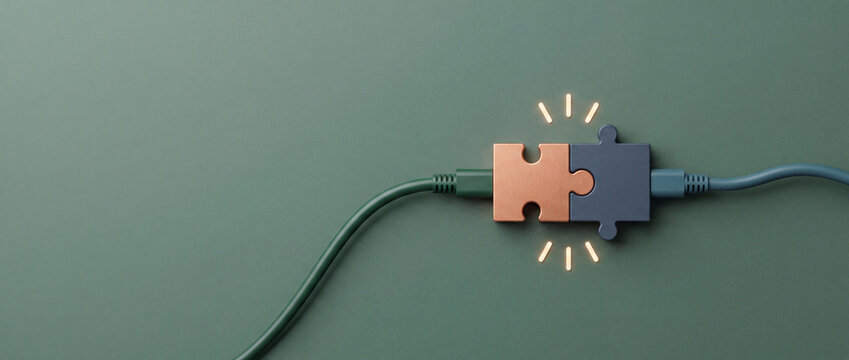 Interlocking puzzle pieces with power cables on a solid green background, representing a seamless digital connection, data integration, innovative networking solutions, and professional teamwork.