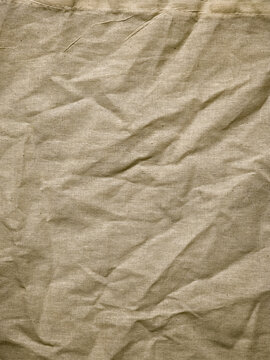 Wrinkled Beige Woven Fabric Texture with Natural Creases