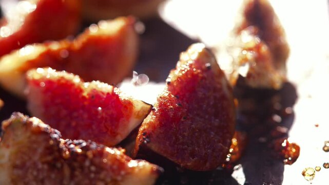 Grilled fig halves on a plate, a delicious gourmet culinary preparation