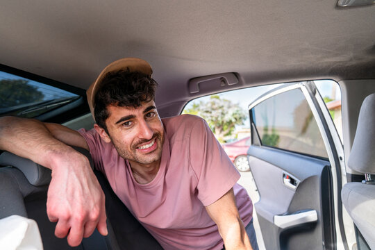 car travel portrait of smiling passenger