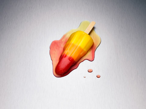 Rocket ice lolly melting on a metal surface