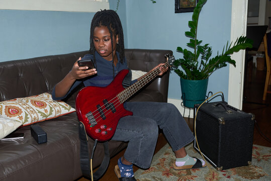 Girl with bass guitar
