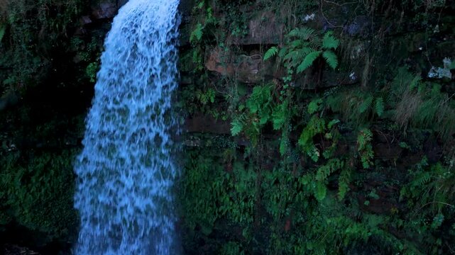 Aerial drone view of a winter landscape and waterfall near Selaya in the Pasiegos Valleys, Cantabria, Spain, Europe
