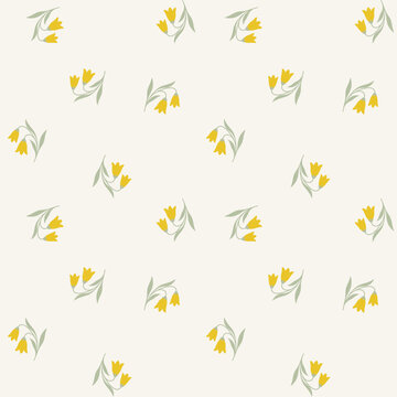 Vibrant yellow spring floral seamless pattern vector with delicate bell flowers and leaves on off white for modern summer textile
