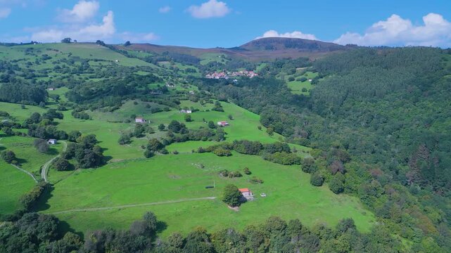 Aerial drone view of the landscape around Castillo Pedroso and the Churr&oacute;n de Borle&ntilde;a. Corvera de Toranzo. Pas Valley in the Pasiegos Valleys region. Cantabria. Spain. Europe