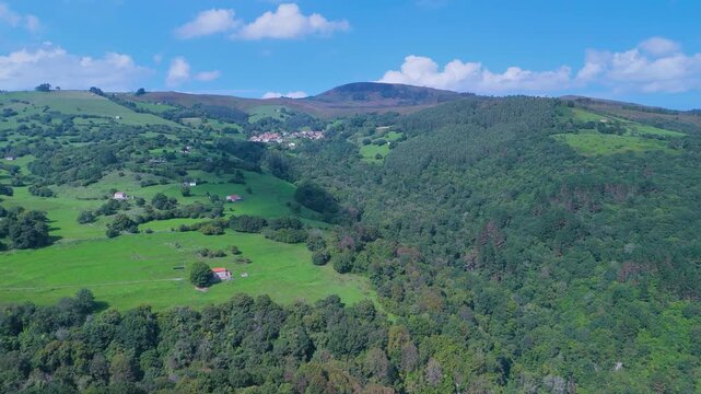 Aerial drone view of the landscape around Castillo Pedroso and the Churr&oacute;n de Borle&ntilde;a. Corvera de Toranzo. Pas Valley in the Pasiegos Valleys region. Cantabria. Spain. Europe