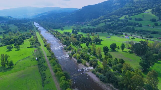 Aerial view from a drone of the Pas River in Corvera de Toranzo. Pas Valley in the Pasiegos Valleys region. Cantabria. Spain. Europe