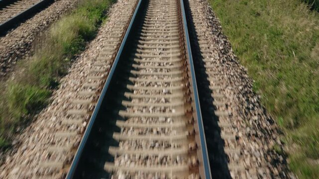 Overhead View of Parallel Railway Tracks with Concrete Sleepers