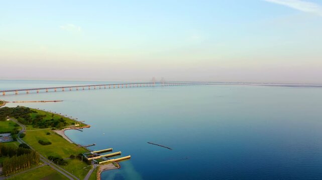 Oresund bridge. A long tunnel bridge with an artificial island between Sweden and Denmark.. Drone footage
