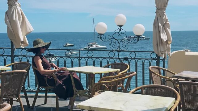 Stylish Woman Enjoys Restaurant View Amalfi Coast Italy