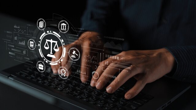 Hands Typing on Laptop Keyboard with Overlay of Legal Icons and Digital Graphics Representing Justice, Law, and Technology Concepts. Entropy.