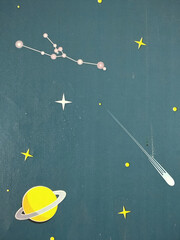 A stylized illustration of a yellow space planet with a white ring around it © Learn to Interpret