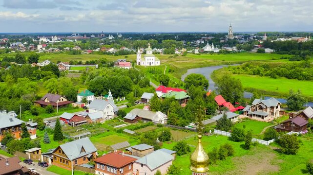 Suzdal, Russia. Flight. Church of Saints Boris and Gleb (Borisoglebskaya) Church and the Church of Elijah the Prophet (Ilyinsky) Church. Drone footage
