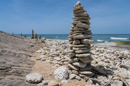 Stone stacks on the beach of Ile de Re.