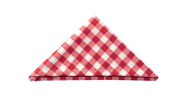 Folded red and white checkered fabric napkin for picnic and restaurant table dining