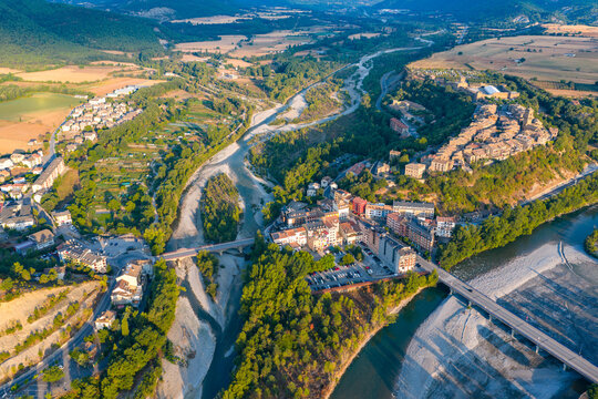 Aerial view above medieval village of Ainsa and castle in Spanish Pyrenees, Huesca, Spain