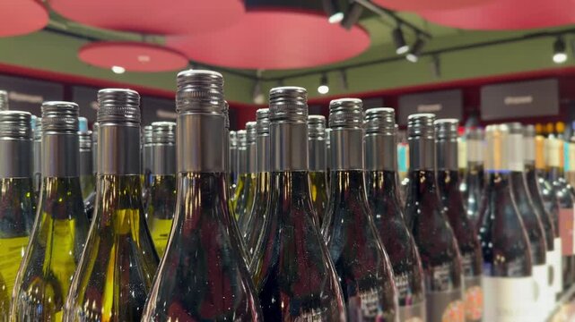 Assorted Alcohol Bottles on Display in Wine Section &ndash; Variety of Wine, Spirits and Liquor on Store Shelves