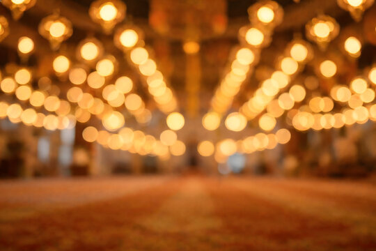 Warm Golden Bokeh Lights Defocused Background for Event and Celebration Themes