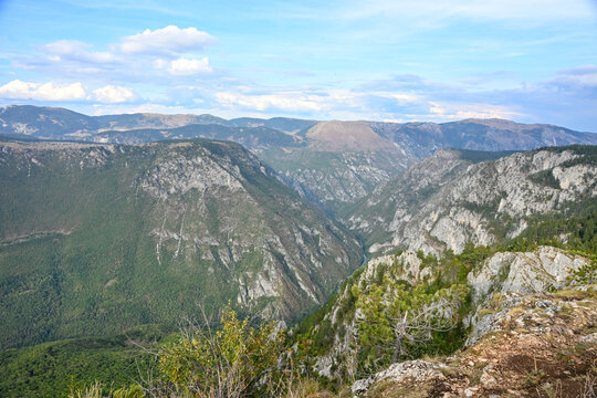 Tara River Canyon viewed from Ćurevac Peak in Durmitor National Park, Montenegro. Deepest river canyon in Europe seen from a high mountain viewpoint.