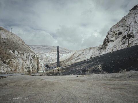 Chimney of the smelting furnace and slag of the smelted metals, La Oroya, Peru