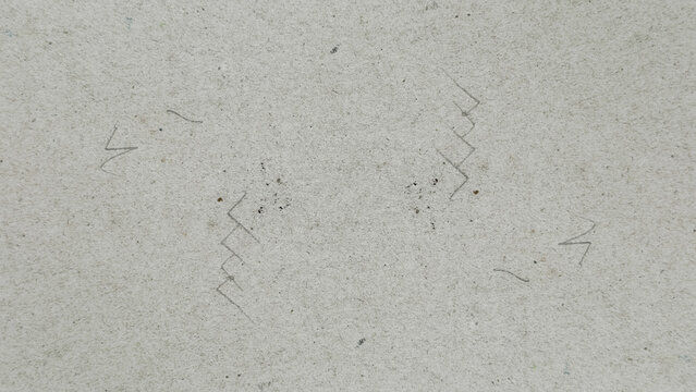 Light grey recycled paper texture background with speckled fibers and faint handwritten pencil marks