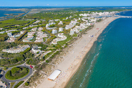 Aerial view of people swimming and relaxing on the beach in La Grande-Motte, H&eacute;rault, South of France