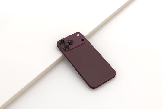 Phone 18 pro Burgundy smartphone resting on minimalist white geometric surface top view