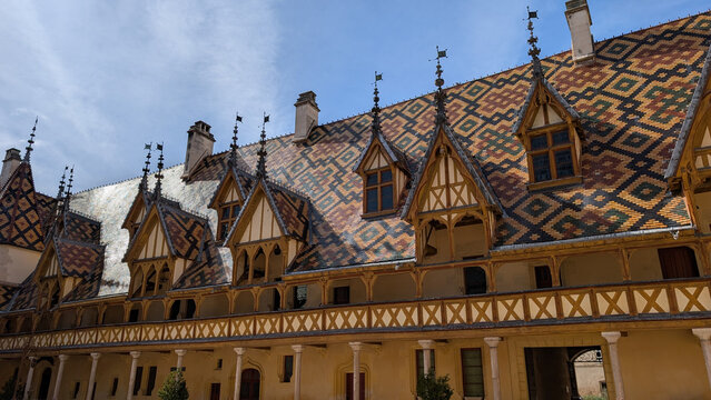 Colorful tiled roof of the Hospices de Beaune in France. 