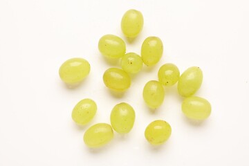 Naklejka premium Fresh ripe grapes on white background, flat lay